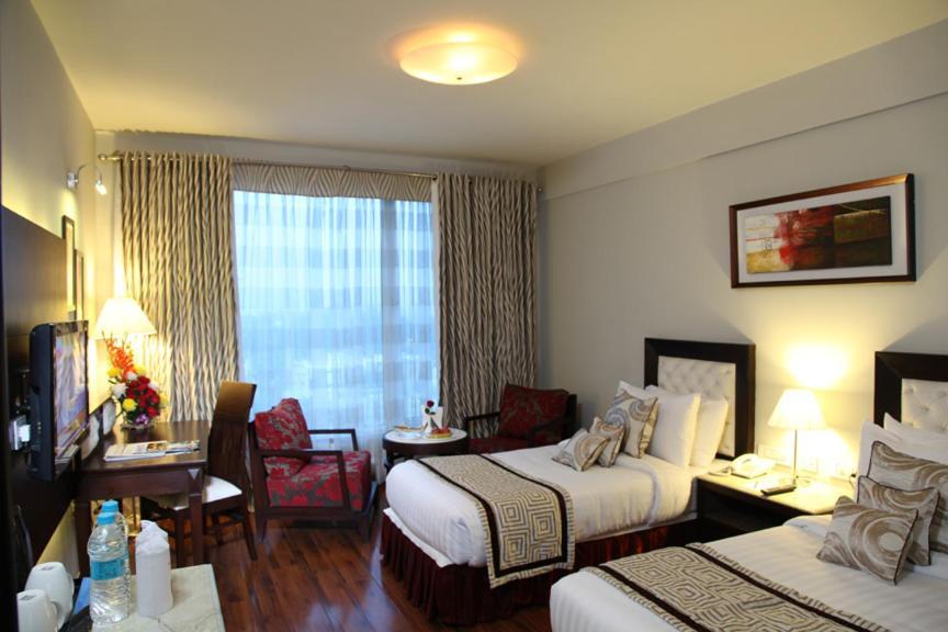 Treehouse Queens Pearl Gurgaon Esterno foto